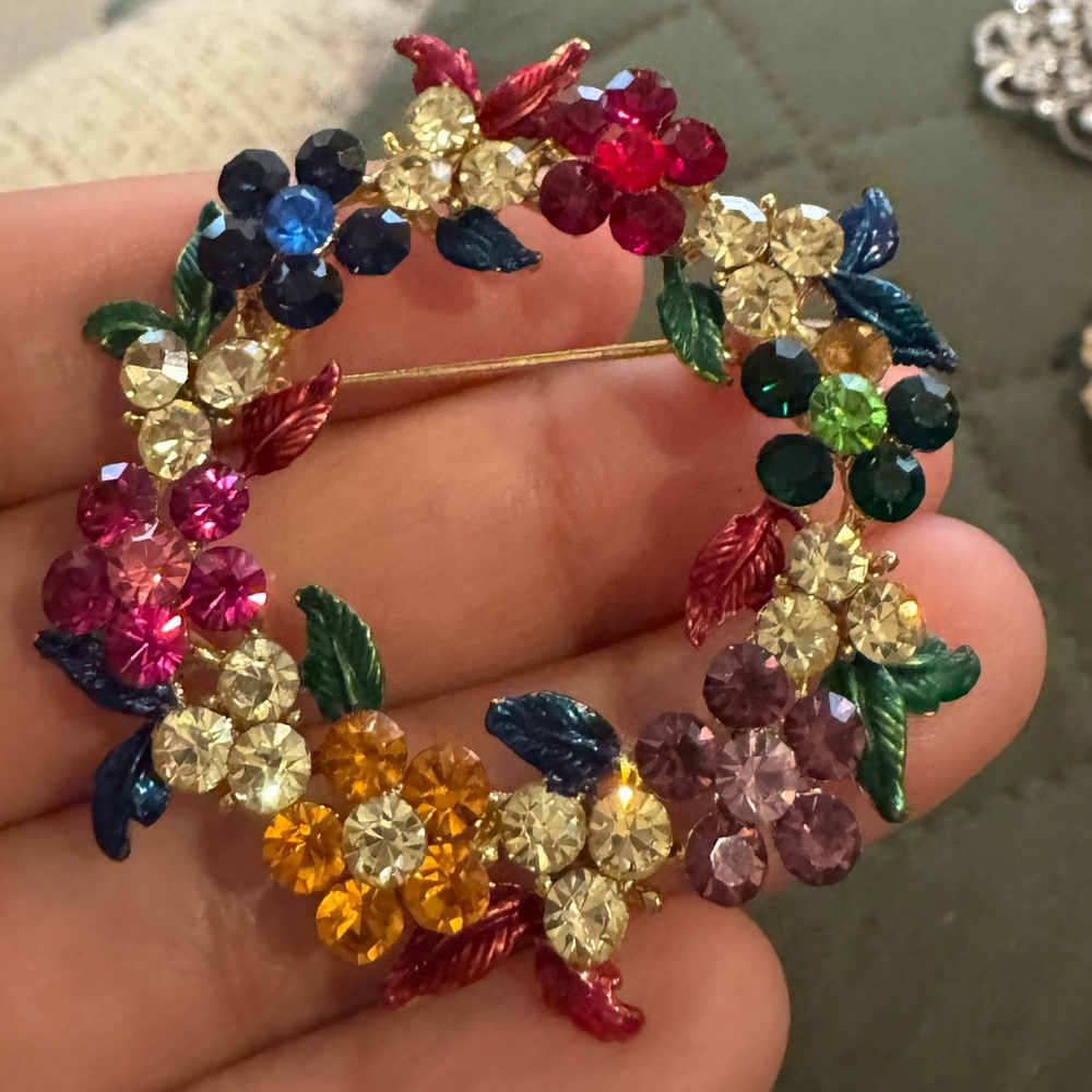 A Multi Colored Wreath Pin